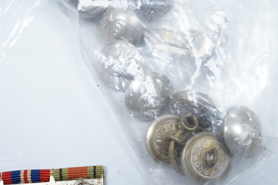 A cased ERII Colonial Police Force Medal for Meritorious Service awarded to John F. Brown, Asst. Supt. Kenya Police., together with a WWII miniature medal set including a General Service Medal with a clasp for Palestine